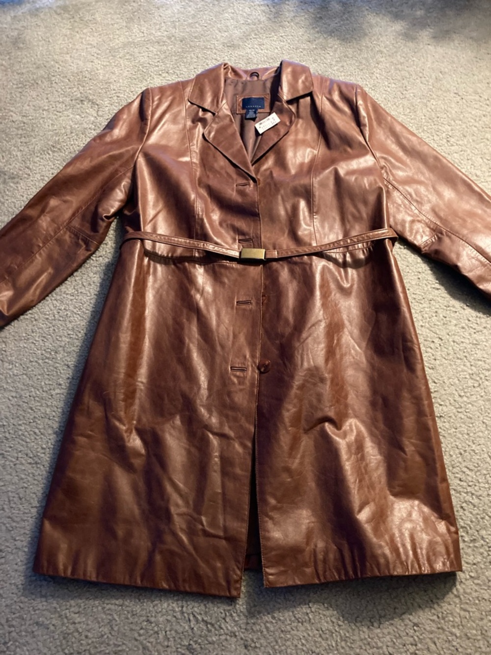 Woman’s leather coat and pants size 14